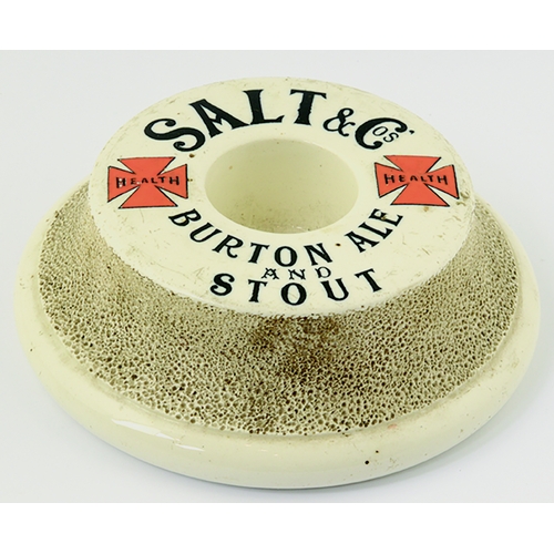 14 - SALT & COS BURTON MATCHSTRIKER. 5.25ins diam. Circular shape off white glaze, textured central strik... 