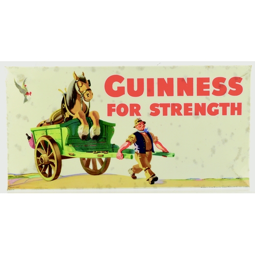 15 - GUINNESS LAMINATED TIN ON CARD ADVERT. 12 by 6ins. Multicoloured image of farmer pulling horse in ca... 