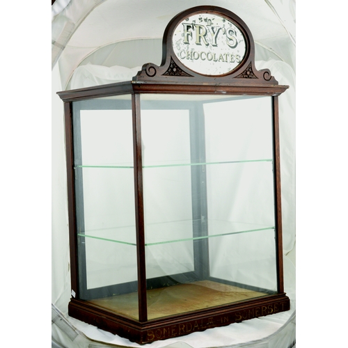 36 - FRY’S CHOCOLATE SHOP DISPLAY CABINET. 31 by 19 by 4ins. Wooden cabinet with original mirrored top pe... 