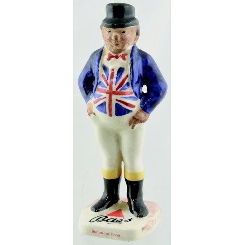 42 - BASS BREWERY FIGURE. 4.5ins tall. Ceramic of man dressed in horse riding gear, Union Jack waist coat... 