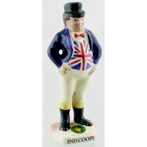 43 - INDE COOPE BREWERY FIGURE. 4.5ins tall. Ceramic of man dressed in horse riding gear, Union Jack wais... 