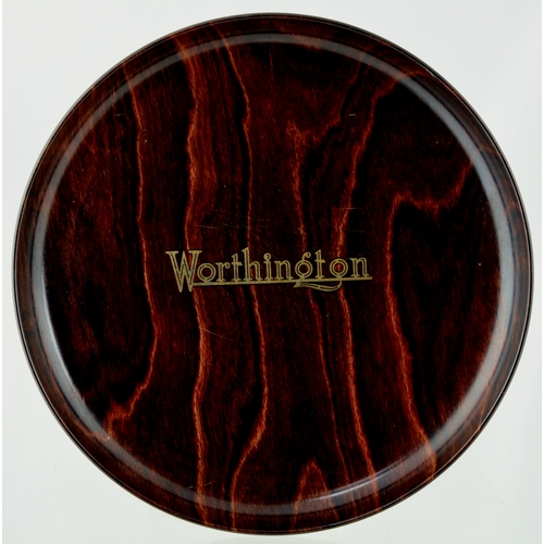 48 - WORTHINGTON BREWERY TRAY. 9.75ins diam. Wood effect, circular tray with WORTHINGTON transferred to c... 