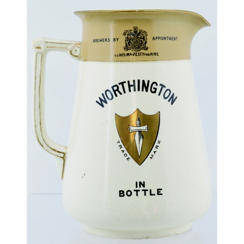 53 - WORTHINGTON BEER JUG. 6.5ins tall. Cream glaze with tan & gold detail for WORTHINGTONS/ IN BOTTLE, c... 