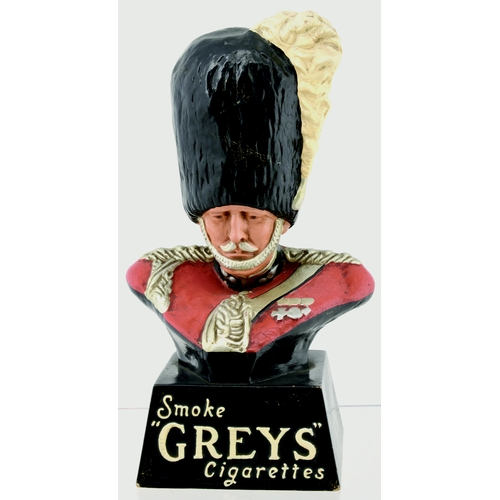 54 - GREYS CIGARETTES SHOP DISPLAY BUST FIGURE. 11ins tall. Rubberoid bust figure of Military Grenadier a... 