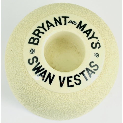 105 - BRYANT AND MAYS SWAN VESTAS MATCHSTRIKER. 4ins diam. Off white, domed shape with all over striking a... 