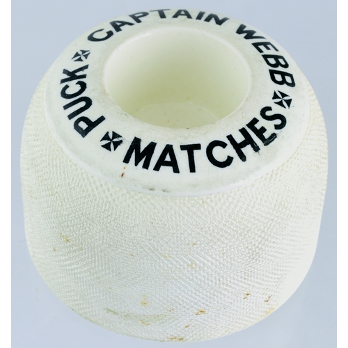 106 - PUCK CAPTAIN WEBB MATCHES MATCHSTRIKER. 4ins diam. Off white, domed shape with all over striking are... 