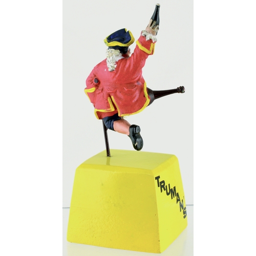 85 - HOPS TRUMANS NOVELTY BACK BAR FIGURE. 9ins tall. Multicoloured rubberoid pirate figure stood atop wo... 