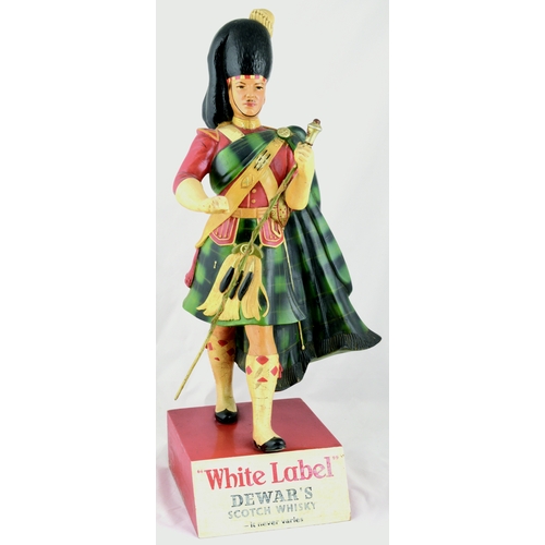 93 - DEWAR’S WHITE LABEL BACK BAR FIGURE. 22ins tall. Herewith a very rare large multicoloured rubberoid ... 