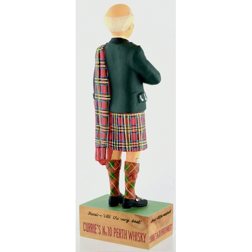 123 - CURRIE’S PERTH WHISKY BACK BAR FIGURE. 13.5ins tall. Kilted Scotsman with drink in hand rubberoid fi... 