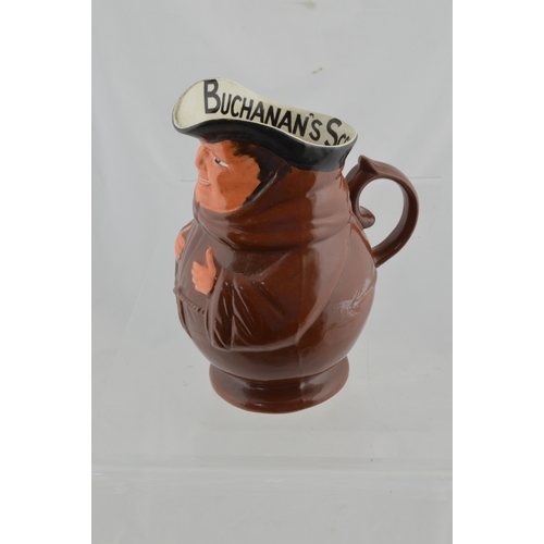 133 - BUCHANAN’S SCOTCH WHISKY WATER JUG. 7.75ins tall. Ceramic jug formed as a jolly monk BUCHANAN’S SCOT... 