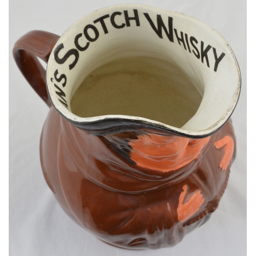 133 - BUCHANAN’S SCOTCH WHISKY WATER JUG. 7.75ins tall. Ceramic jug formed as a jolly monk BUCHANAN’S SCOT... 