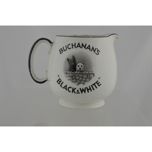 136 - BUCHANAN’S BLACK & WHITE WHISKY WATER JUG. 5ins tall. Bulbous body jug with BUCHANAN’S/ ASK FOR IT!/... 