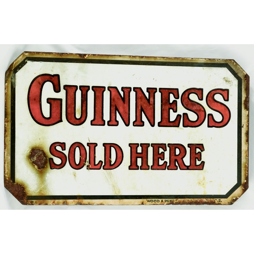 166 - GUINNESS DOUBLE SIDED ENAMEL SIGN. 18 by 11ins. Lozenge shape enamel sign GUINNESS/ SOLD HERE. Overa... 