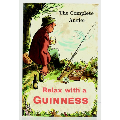 167 - GUINNESS LAMINATED TIN ON CARD ADVERT. 12 by 8ins. Multicoloured pict. image of an angler fishing dr... 