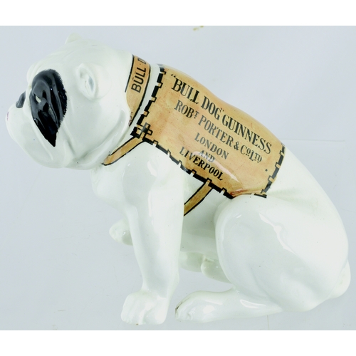 171 - GUINNESS BULL DOG FIGURE. 6ins tall. Ceramic figure in shape of a sitting, black eyed, bull dog, whi... 