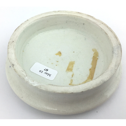 5 - WEST KENSINGTON CHERRY
TOOTH PASTE POT LID. (APL, p366, 40) 3.25ins diam. Large central image of che... 