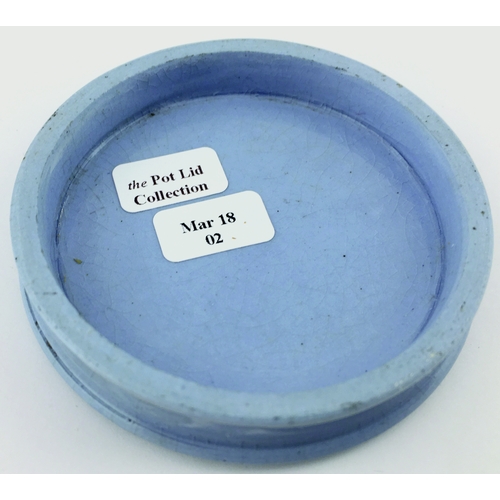 24 - MANCHESTER CARBO-NEROLINE
POT LID. (APL, p 433, 126) 2.75ins diam. Blue
glaze, black transfer for WA... 