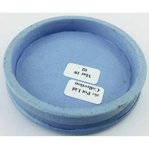 24 - MANCHESTER CARBO-NEROLINE
POT LID. (APL, p 433, 126) 2.75ins diam. Blue
glaze, black transfer for WA... 