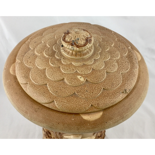 62A - STONEWARE WATER FILTER. 15ins tall. All over light tan salt glaze, with raised detail of heron (?) w... 