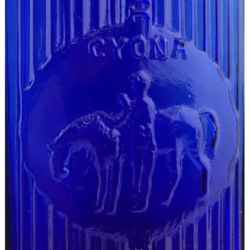 63 - CYONA POISON BOTTLE. (DP pg 108) 5.75ins tall, cobalt blue glass round shouldered rectangular shape ... 