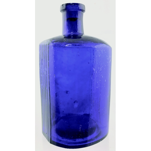 67 - HOBNAIL POISON BOTTLE. (DP pg 144) 6.75ins tall. Cobalt blue glass, curved back with vertical
ribs. ... 