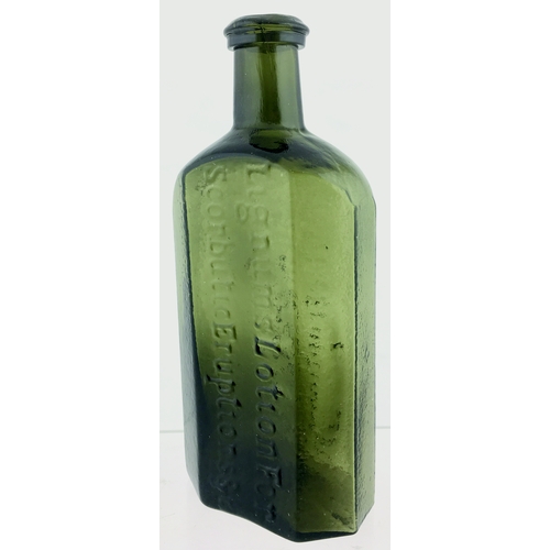 71 - LIGNUMS EARLY MEDICINE BOTTLE.
7ins tall, variating light olive green glass,
flattened octagonal sha... 