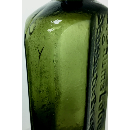 71 - LIGNUMS EARLY MEDICINE BOTTLE.
7ins tall, variating light olive green glass,
flattened octagonal sha... 