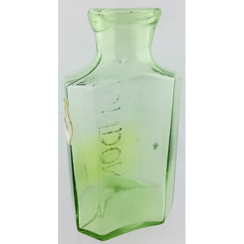 73 - LONDON PONTILLED MUSTARD BOTTLE. 5.25ins tall. Aqua glass with an unusual light yellow area to one c... 