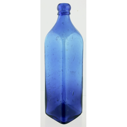 78 - HANDYSIDES DRINK PREPARATION.
10.5ins tall. Rectangular shape, rounded shoulders, blue glass, applie... 