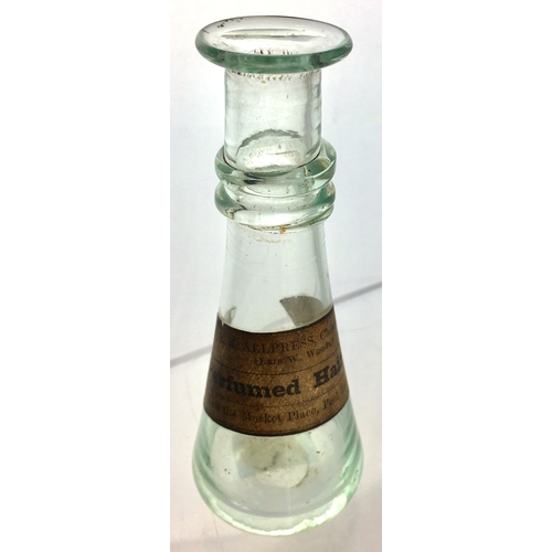 79 - ISLE OF MAN PONTILLED HAIR OIL
BOTTLE. 4.25ins tall. Aqua glass, funnel shape, flared lip, base pont... 