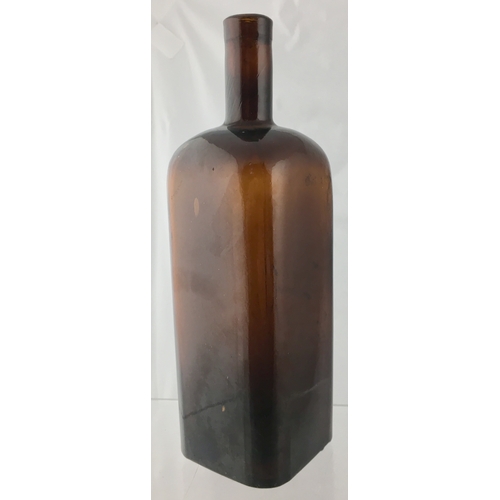 81 - WM RADAM’S MICROBE KILLER BOTTLE. 11ins
tall. Deep amber glass rectangular shape, embossed GERMBACTE... 