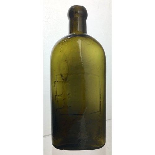 82 - WARNERS SAFE NERVINE LONDON.
7.25ins tall. Olive green glass, blob lip, sloping
shoulders, curved fr... 