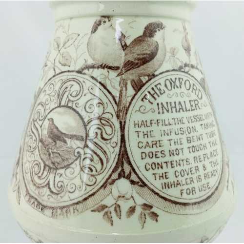 83 - THE OXFORD INHALER. 5.5ins tall to lid top. Ceam glaze, brown bird & floral design all over
THE OXFO... 