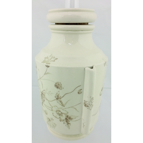 84 - THE WESTMINSTER INHALER. 6.25ins tall to top of lid. Cream glaze, all over brown floral decoration T... 