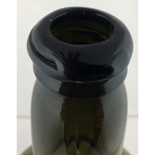 116 - SEALED CYLINDER WINE BOTTLE. 11ins tall.
Variating green glass, rounded shoulders, applied seal MAG ... 