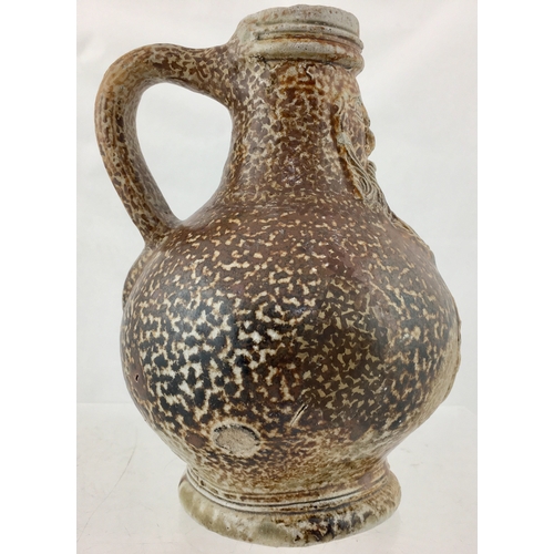 119 - BELLARMINE JUG. 6.5ins tall. Fabulous variating tiger glaze, bulbous bodied bellarmine jug, bearded ... 