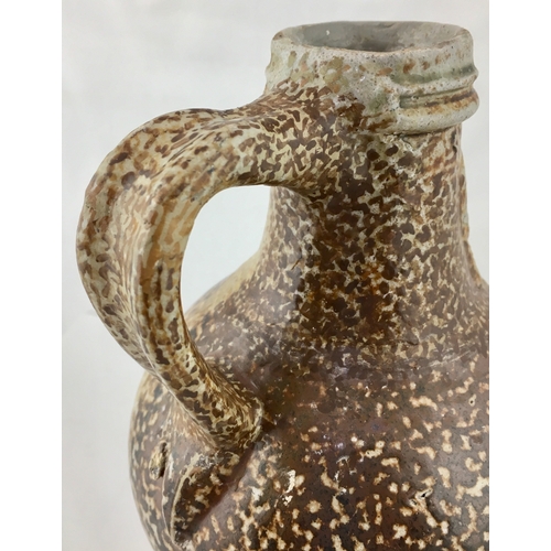 119 - BELLARMINE JUG. 6.5ins tall. Fabulous variating tiger glaze, bulbous bodied bellarmine jug, bearded ... 