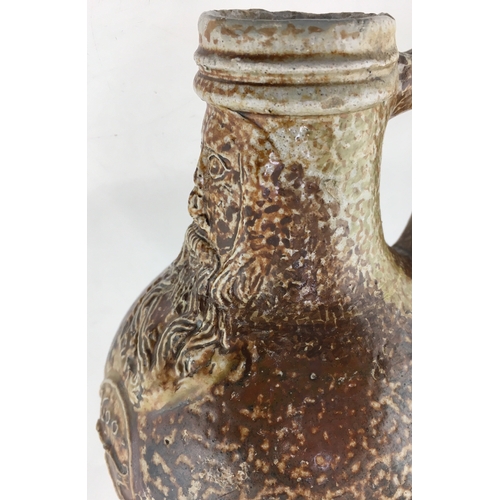 119 - BELLARMINE JUG. 6.5ins tall. Fabulous variating tiger glaze, bulbous bodied bellarmine jug, bearded ... 