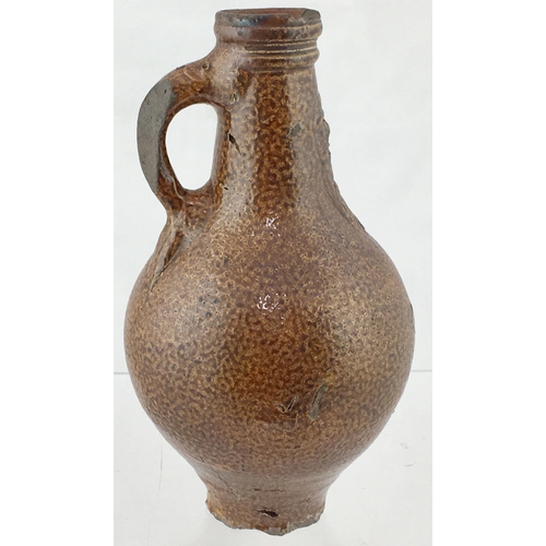 122 - BELLARMINE JUG. 8.5ins tall. Fabulous variating tiger glaze, bulbous bodied bellarmine jug, bearded ... 