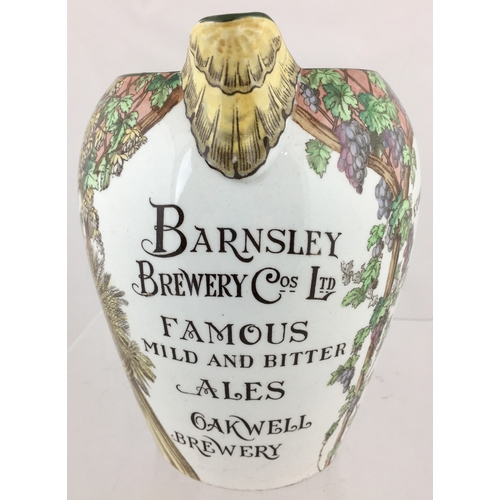 158 - BARNSLEY BREWERY CO LTD PUB JUG. 6.75ins tall. Transferred to front BARNSLEY/ BREWERY COS LTD/ FAMOU... 