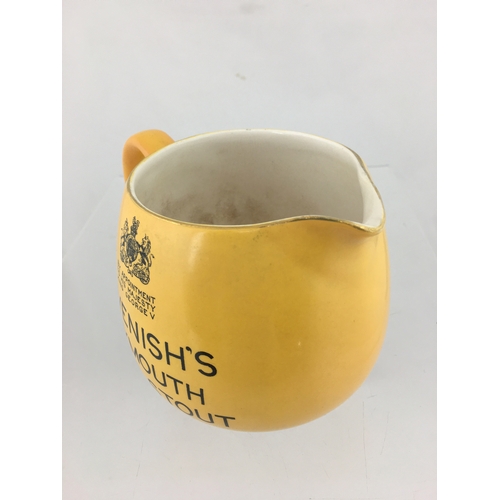 159 - WEYMOUTH PUB JUG. 4ins tall. Bulbous
bodied jug, all over yellow glaze, black transfer
DEVENISH’S/ W... 