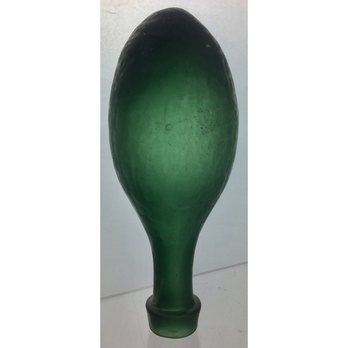 178 - L.A. STONE HAMILTON BOTTLE. 7ins long. Extremely dark aqua, almost green glass,
squat-shaped America... 