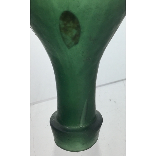 178 - L.A. STONE HAMILTON BOTTLE. 7ins long. Extremely dark aqua, almost green glass,
squat-shaped America... 