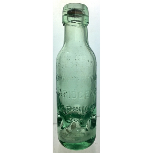 183 - SANKEYS PATENT BOTTLE. 7ins tall. Aqua glass 6oz, 6 retaining lugs to base to retain the hollow roun... 