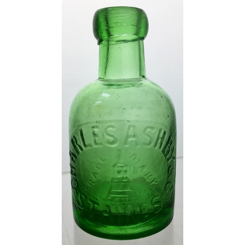 184 - STAINES SELTZER BOTTLE.
4.75ins tall. Light green glass, squat
shape, blob lip, embossed CHARLES
ASH... 