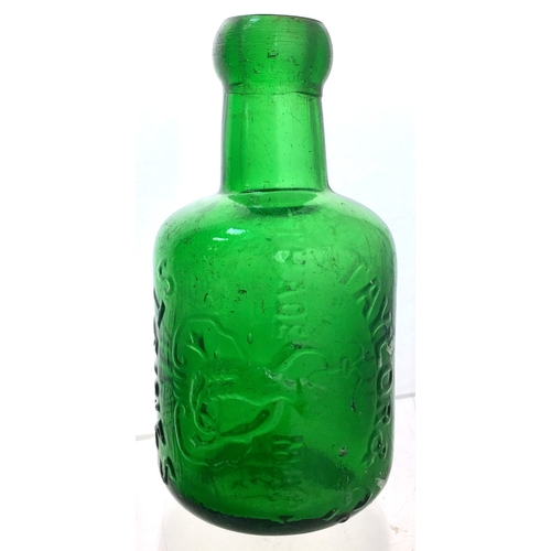 185 - STAINES SELTZER
BOTTLE. 5ins tall. Mid green
glass, squat shape, blob lip,
embossed vertically TAYLO... 