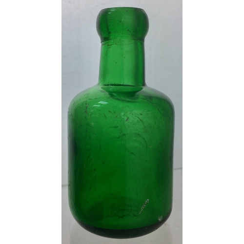 185 - STAINES SELTZER
BOTTLE. 5ins tall. Mid green
glass, squat shape, blob lip,
embossed vertically TAYLO... 