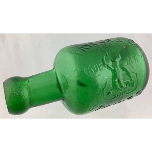 185 - STAINES SELTZER
BOTTLE. 5ins tall. Mid green
glass, squat shape, blob lip,
embossed vertically TAYLO... 