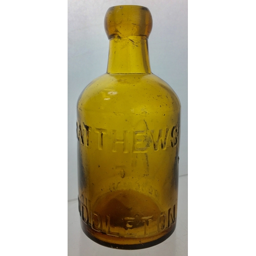 186 - MIDDLETON
(ROCHDALE) SELTZER
BOTTLE. 6.25ins tall. Amber
glass, cylinder shape, blob lip.
One side e... 