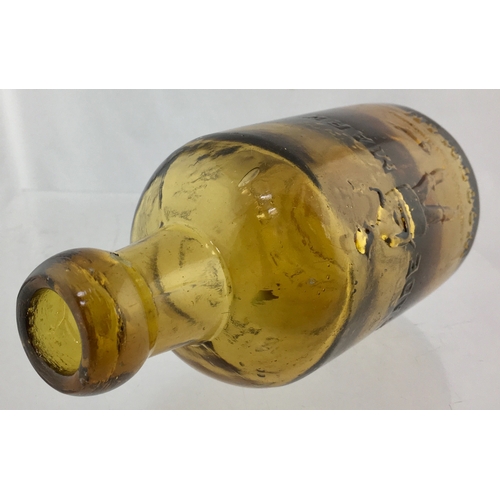 186 - MIDDLETON
(ROCHDALE) SELTZER
BOTTLE. 6.25ins tall. Amber
glass, cylinder shape, blob lip.
One side e... 